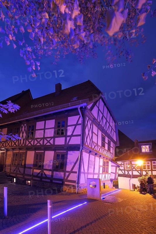 Leaning house with artificial lighting, half-timbered house, blue hour, twilight, night view, light strips, Wernigerode, Harz, Saxony-Anhalt, Germany