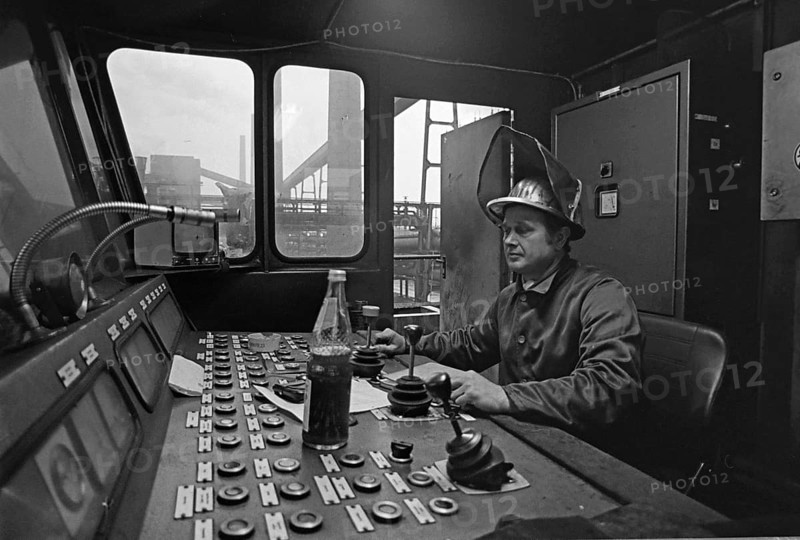 Essen, DEU, 17.11.85 - Worker at the Zollverein coking plant, printing machinist. The coking plant was discontinued in 1993. Together with Zollverein Colliery, the former coking plant was declared a World Heritage Site by UNESCO in 2001, Essen, Germany