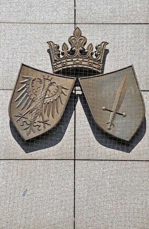 The coat of arms of the city of Essen is a heraldic speciality: It consists of two shields and is therefore a so-called alliance coat of arms or composite coat of arms, entrance area of the town hall. With a height of 106 metres and 69, 000 square metres of office space, Essen City Hall is one of the largest in Germany, Essen, North Rhine-Westphalia, Germany