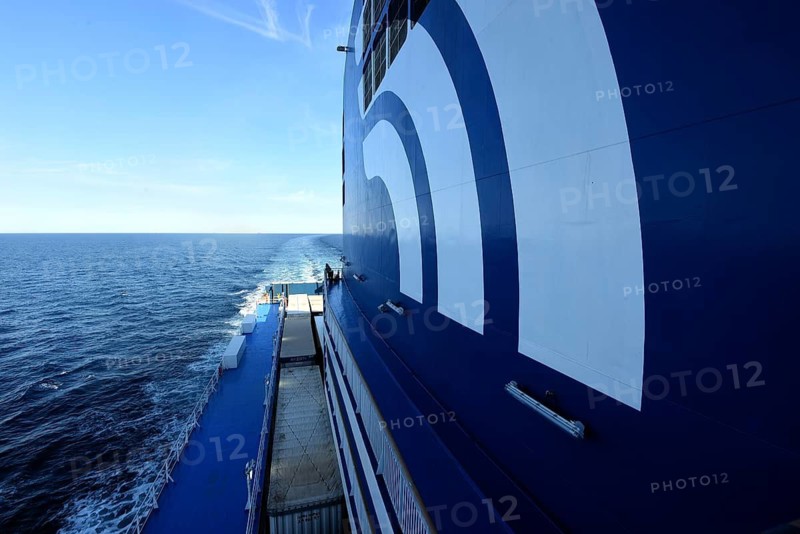 A car ferry of the GNV shipping company on its way from Palermo / Sicily shortly in front of entering the harbour of Genoa. Lorry trailers and cars can be seen on board