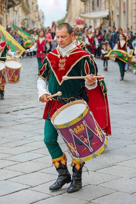 Participants wearing historical costumes on parade, Noto, Noto Valley, Sicily, Italy