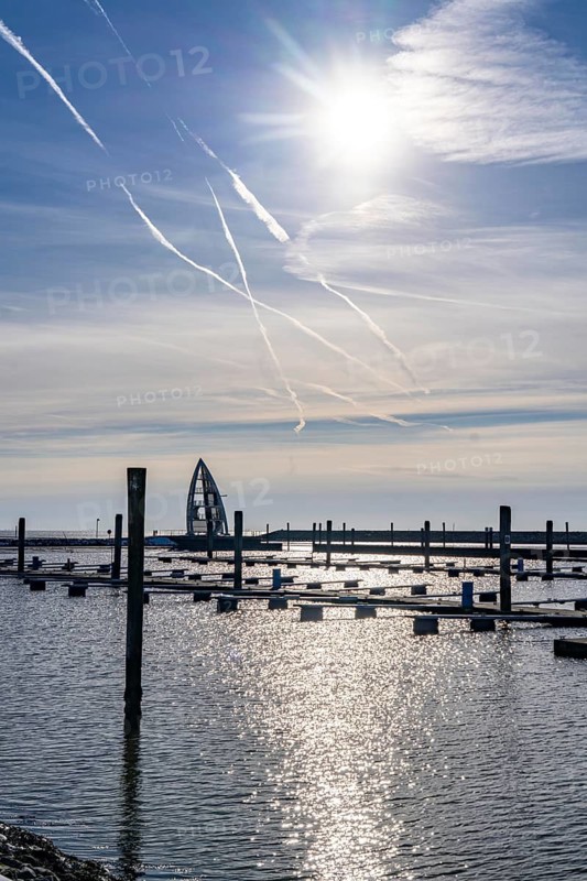 The East Frisian North Sea island of Juist in winter, empty sports harbour, lookout tower Seezeichen Juist, Lower Saxony, Germany