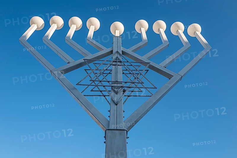 Large Hanukkah chandelier at the Brandenburg Gate in daylight, sign of lively Jewish life, symbolic power for 20 years, Berlin, Germany