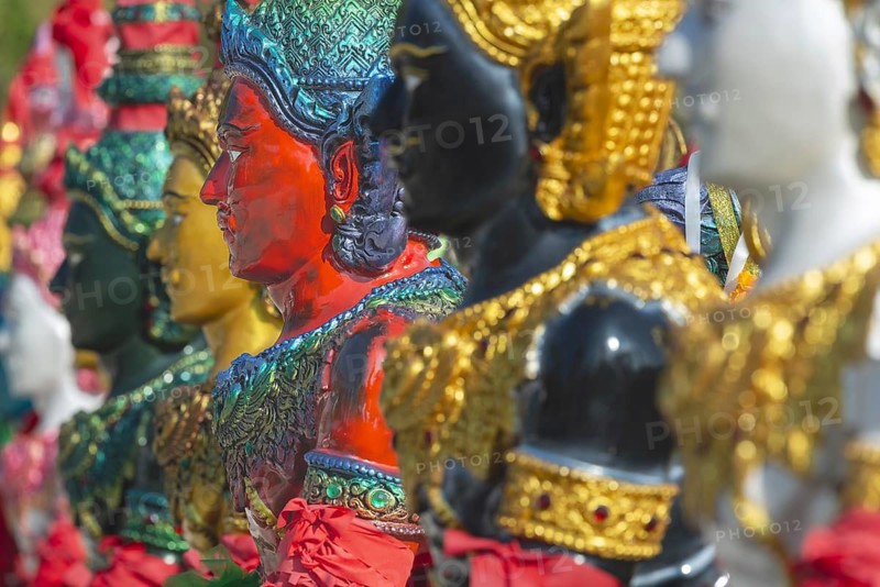 Thai style angel, graceful figures, in traditional golden clothing with ornate headdress, Thai Buddhism, Hinduism, Wat Pa Khasamakhi, Khao Kho Mountains, Phetchabun province, Isan, Thailand