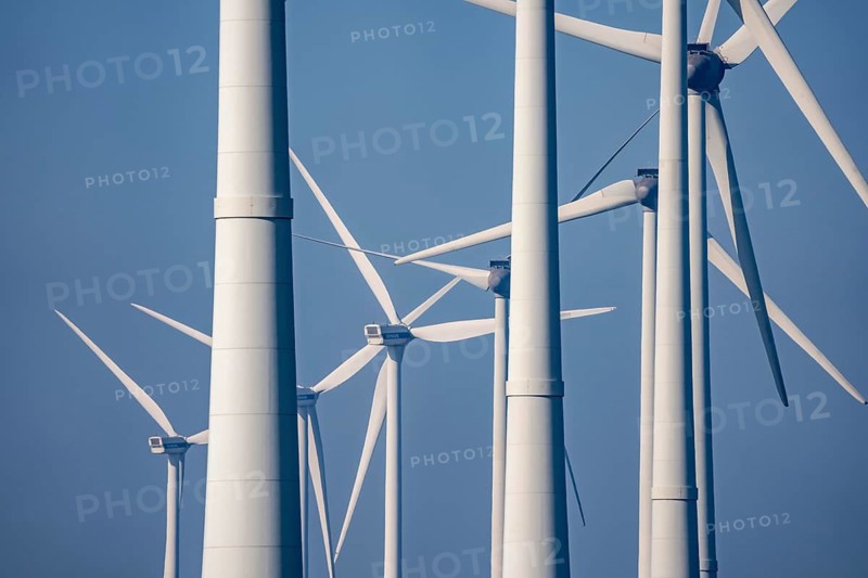 Wind farm in the north of the Netherlands, near Eemshaven, energy center, in addition to wind energy, there are coal and gas power plants and various energy infrastructure facilities here, Netherlands