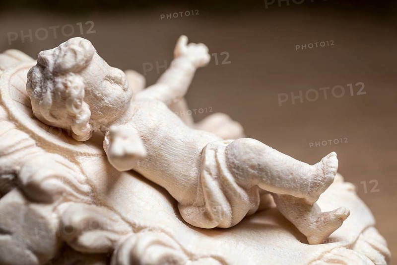 I'm standing at your crib here, wooden crib figure, the birth of Jesus Christ Child lying in a crib in a stable as a little Christ Child, Christmas