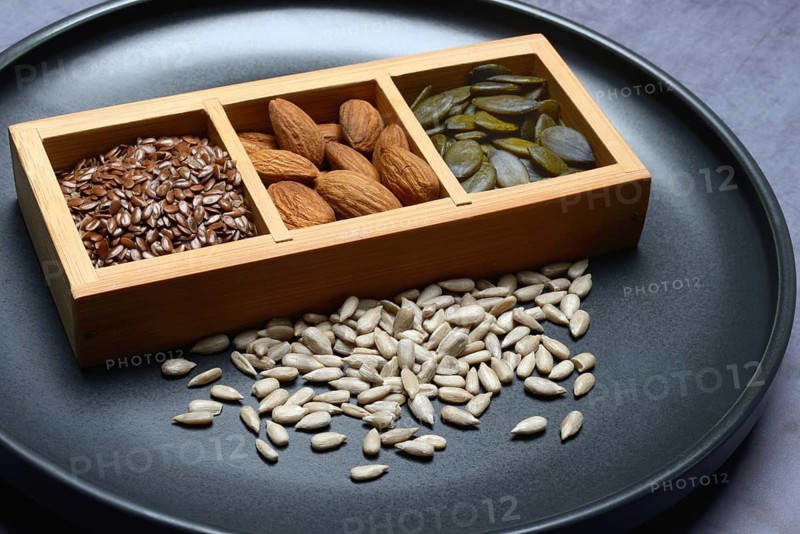 Kernels, mix of almond kernels, sunflower seeds, linseeds and pumpkin seeds