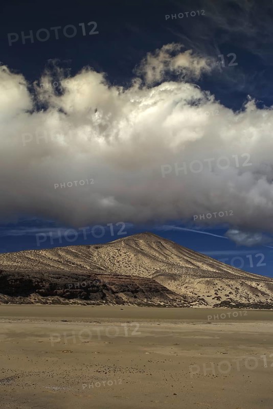 Beach landscape with dunes and clouds under a clear blue sky, Pajara, Fuerteventura, Canary Islands, Spain