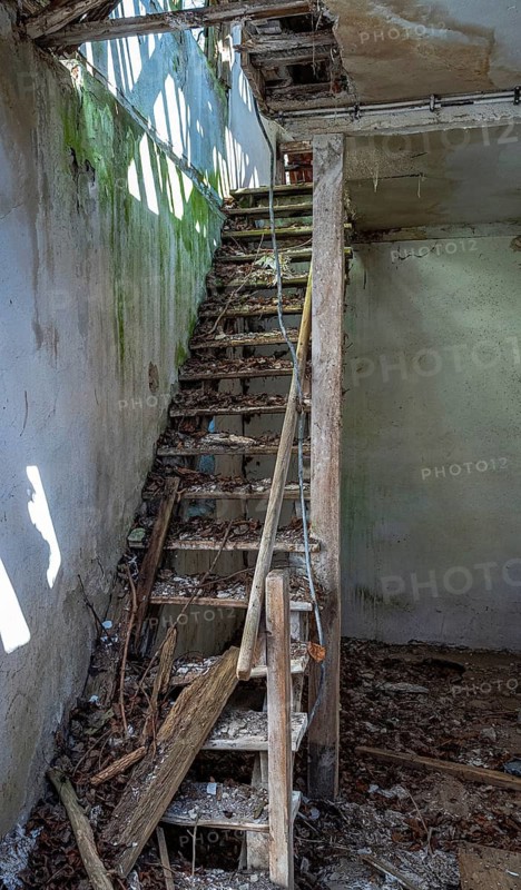 Abandoned and derelict farmhouses on undeveloped land in Rügen, Mecklenburg-Vorpommern, Germany
