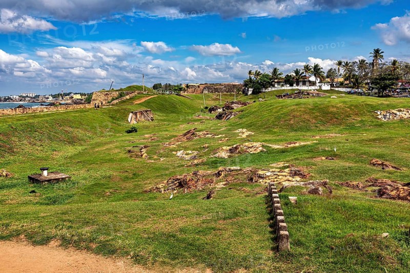 Green landscape with historic charm under cloudy skies, The fortress of Galle in Sri Lanka