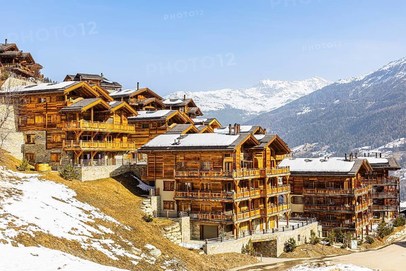 Modern wooden holiday homes with snow-covered roofs, Grimentz, Val d'Anniviers, Valais Alps, Canton of Valais, Switzerland