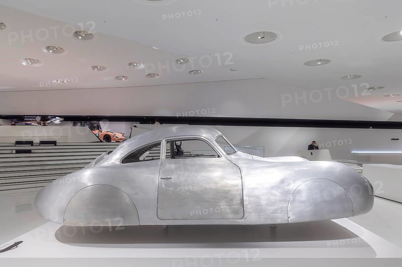 Porsche Museum Stuttgart. The Porsche Type 64, built in 1939, is the forefather of all Porsche sports cars. The automotive museum of Dr. Ing. h.c. F. Porsche AG shows racing cars and iconic cars from automotive history. interior view. Zuffenhausen, Stuttgart, Baden-Württemberg, Germany