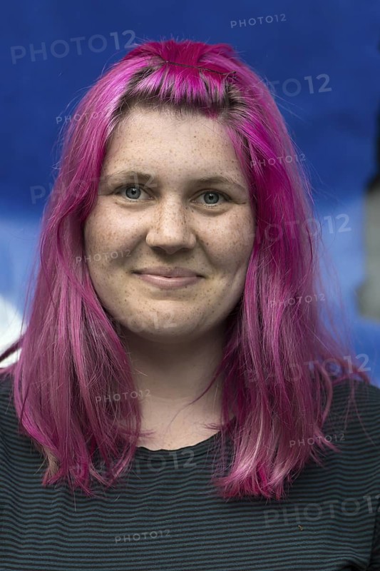 Portrait of a young woman with freckles and violet-colored hair, Ringsheim, Baden-Württemberg, Germany