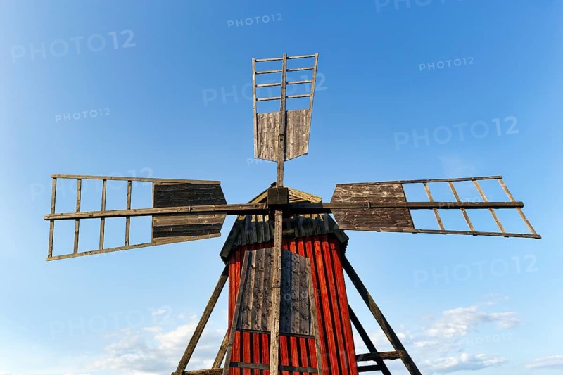 Classic red trestle windmill, typical landmark, tourist attraction and photo opportunity, detail, Alvedsjöbodar, Borgholm, Öland island, Kalmar län, Sweden