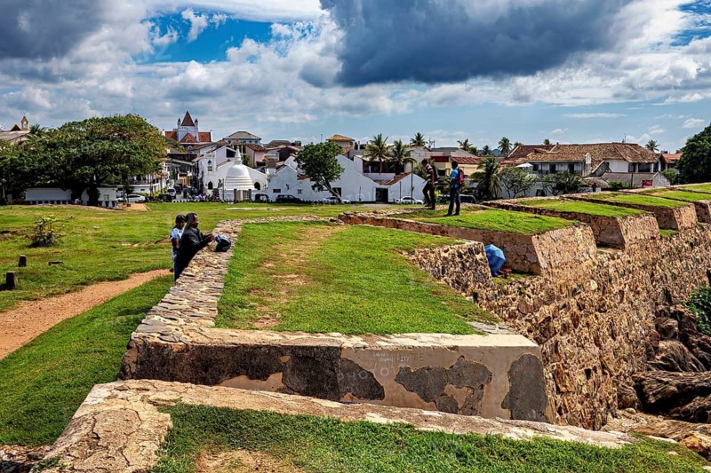 Historic walls overlooking a city and cloudy sky, The fortress of Galle in Sri Lanka