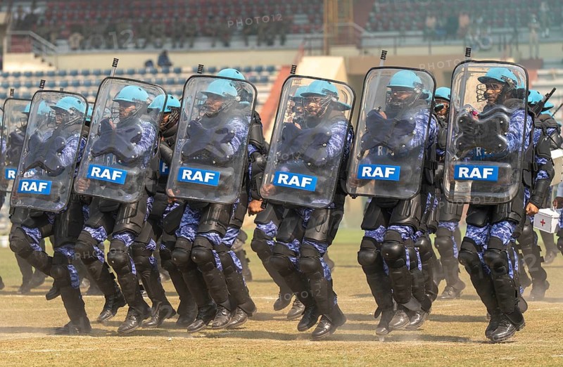 Personnel of the Rapid Action Force (RAF), a specialised unit of the Central Reserve Police Force, conduct an anti-riot drill with protective shields during the 87th Raising Day celebrations, on February 19, 2026 in Guwahati, India