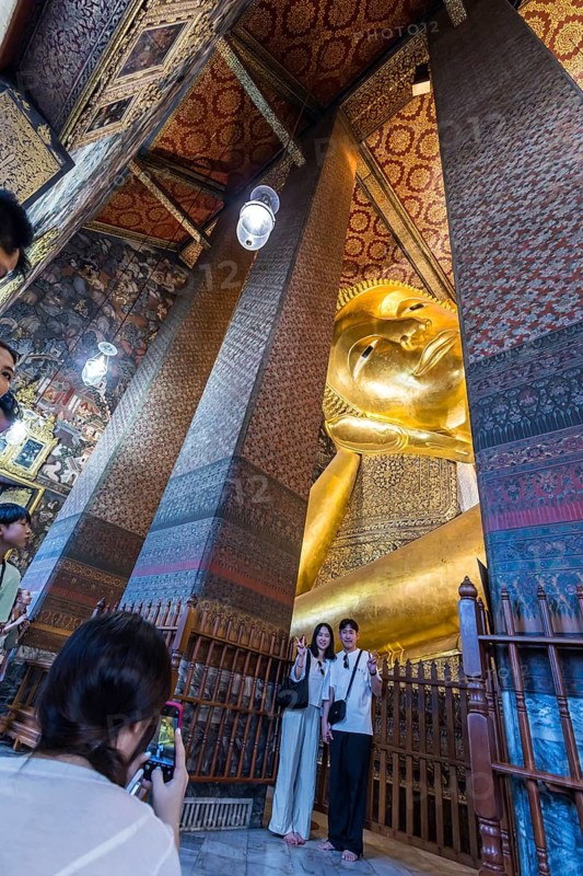 Wat Pho, temple of the reclining Buddha. Sightseeing attraction, architecturally significant temple complex. It is home to Phra Buddhasaiyas. The gilded Buddha statue is 46 metres long and 15 metres high. Bangkok, Thailand