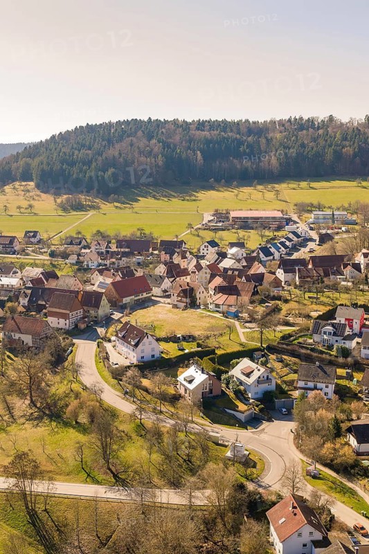 Idyllic village in a hilly landscape with winding roads and residential buildings, Pfrondorf, Nagold, Calw district, Germany