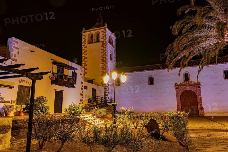 Illuminated view of Santa Maria de Betancuria church in Fuerteventura, Canary Islands, Spain capturing its serene ambiance and historical architecture at night