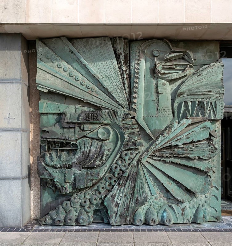 Artwork sculpture entrance door of Roman Catholic cathedral church, Metropolitan Cathedral of Christ the King, city of Liverpool, England, UK