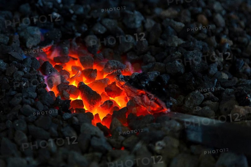 A blacksmith forging, working at the Ehnert forge in Dresden-Bühlau, Saxony, Germany