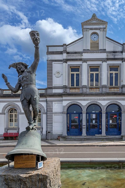 Sculpture Den Bonmo in front of railway station in the city Ronse, Renaix, oldest train station of the European Continent, East Flanders, Belgium