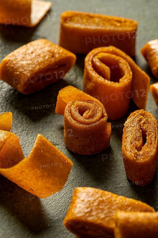 Sea buckthorn and apple fruit leather rolls. These healthy, chewy snacks offer a burst of natural flavors, perfect for on-the-go enjoyment
