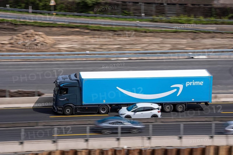 Freight truck from the online department store Amazon Prime, on the highway