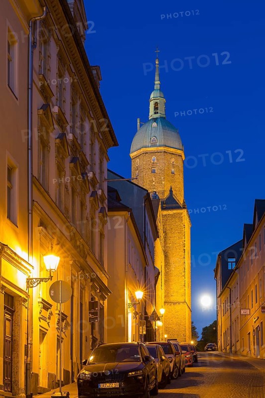 Große Kirchgasse to St Annen Church at dusk and full moon, Annaberg-Buchholz, Erzgebirge, Saxony, Germany