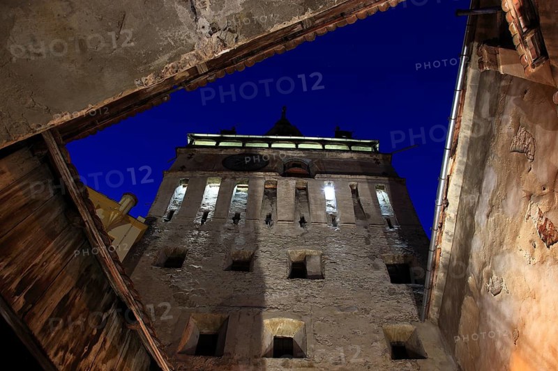 Romania, hour tower at the blue hour in the historic old town of Sighisoara, German Sighisoara, town in Mures district in Transylvania, UNESCO World Heritage Site