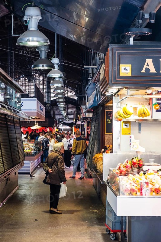 Editorial use onlyMarket stalls and visitors at La Boqueria market in Barcelona, Spain