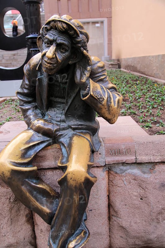 Miljo or Milyu statue, 'The Great Gossiper', Knyaz Aleksander street, Plovdiv, Bulgaria, eastern Europe