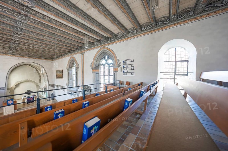 View of a gallery with modern benches and prayer books, Deufringen, Aidlingen, Böblingen district, Germany