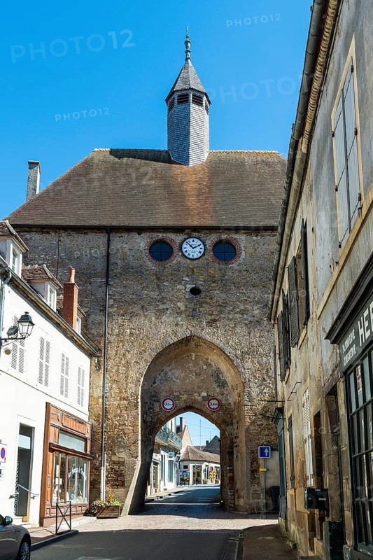 Land of Troncais, Ainay le Chateau. The clock gate. Allier department. Auvergne Rhone Alpes. France