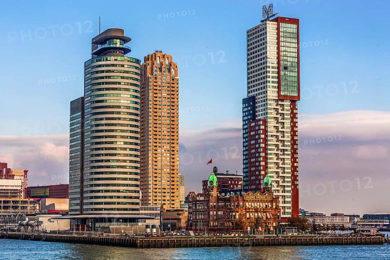 Hotel New York, historic art nouveau building on the Kop van Zuid, former headquarters of the Holland America Line, thousands of emigrants once left this place for North America, modern architecture in the city panorama, Rotterdam, Netherlands