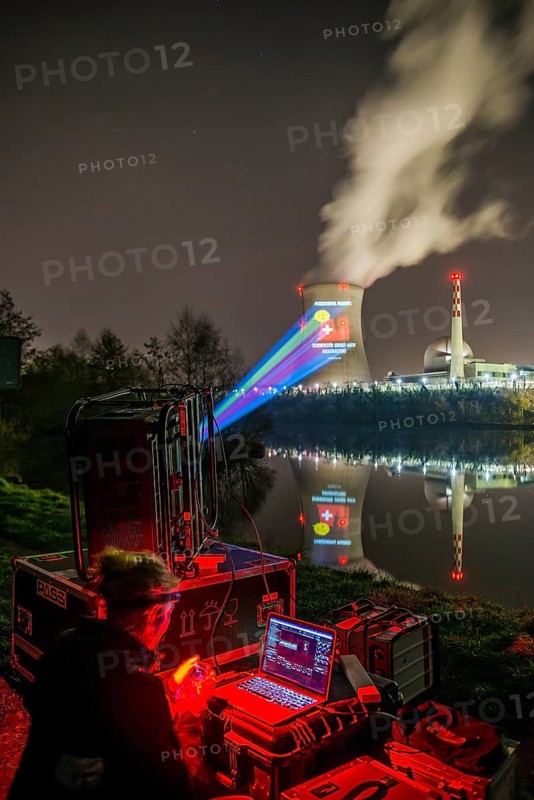 Protest action broadcast by the anti-nuclear organization, projection, night view, 05-03-2026, Waldshut, Leibstadt nuclear power plant, Rhine, Upper Rhine, Canton of Aargau, Switzerland