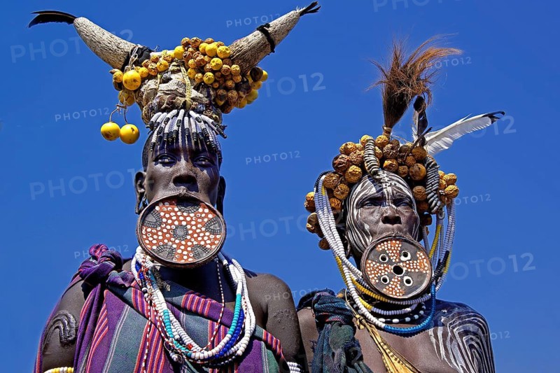 Ethiopia, Mursi woman, lip plates, plate lips, dhebi, body painting, decorative scars, two people, portrait, Mursi people, plate lips, Ethiopia