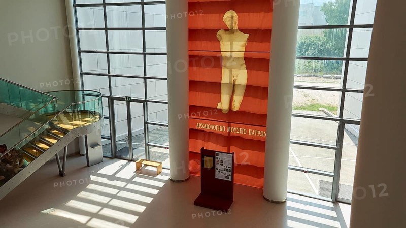 Entrance area of a museum with statue, glass walls and natural light, Patras Archaeological Museum, Patras, Peloponnese, Greece