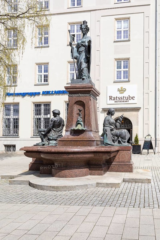 Saxonia fountain with blacksmith and spinner on Johannisplatz, Chemnitz, Saxony, Germany