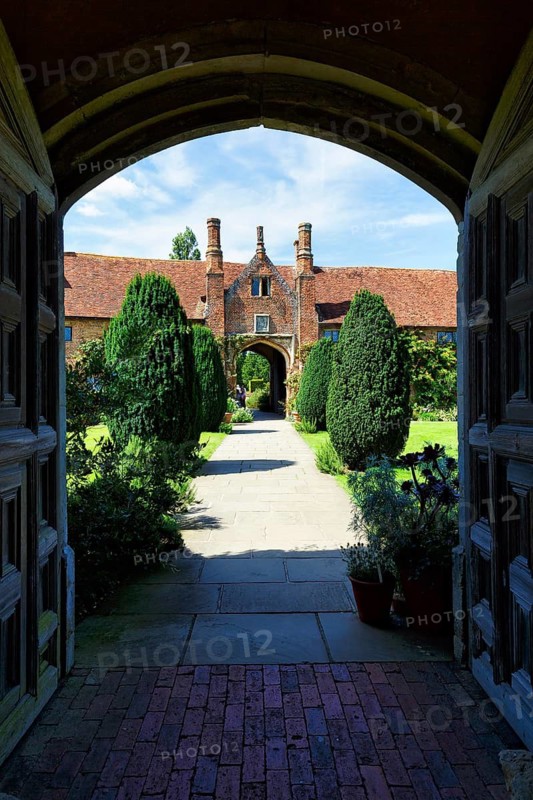 View through an archway, Sissinghurst Castle and Garden, Cranbrook, Kent, England, Great Britain
