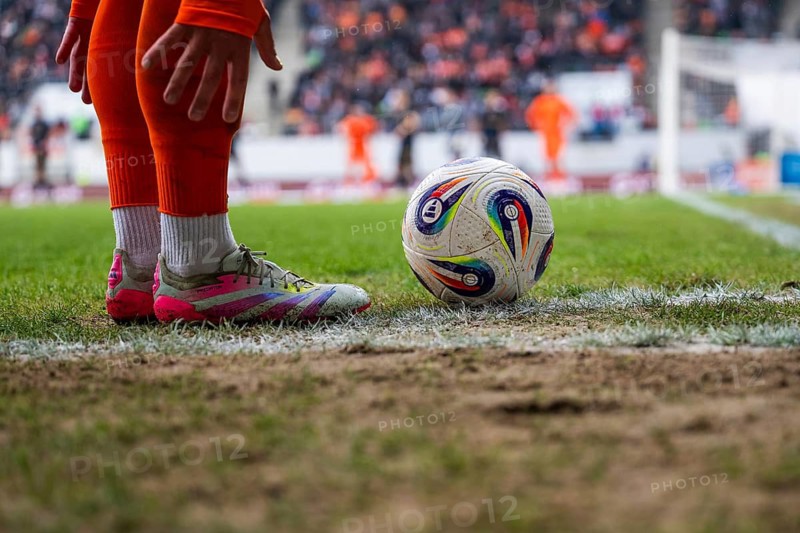 LUBIN, POLAND - MARCH 15, 2026: Football match between KGHM Zaglebie Lubin vs Lech Poznan. Detail of player's legs and the ball in the corner