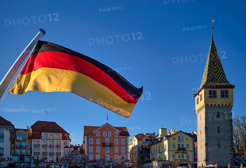 German flag, German flag, flying on ferry, behind Mangturm, promenade, Lindau, Bavaria, Lake Constance, Germany