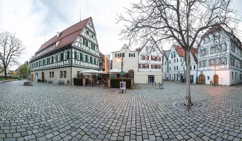 April 19, 2026: Panoramic view of Schlossplatz with Kirchheim Castle and Old Forestry House at early morning. Kirchheim unter Teck, Baden Württemberg, Germany