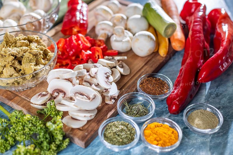 Fresh ingredients such as peppers, carrots and mushrooms in addition to spices and herbs