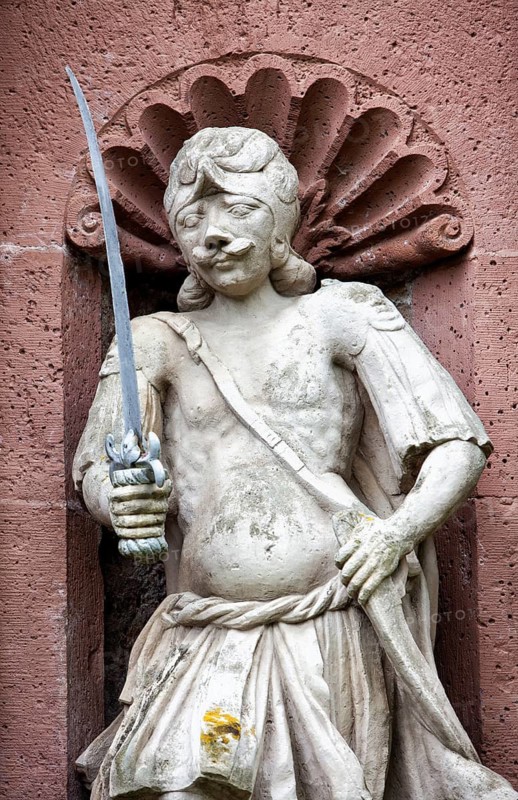 Stone figure at the entrance gate, Abbey Castle Corvey in Hoexter, Weserbergland, North Rhine Westphalia, Germany, Europe, Figur am Eingangstor, ehemalige Abtei und Schloss Corvey in Höxter, Weserbergland, Nordrhein-Westfalen, Deutschland, Europa