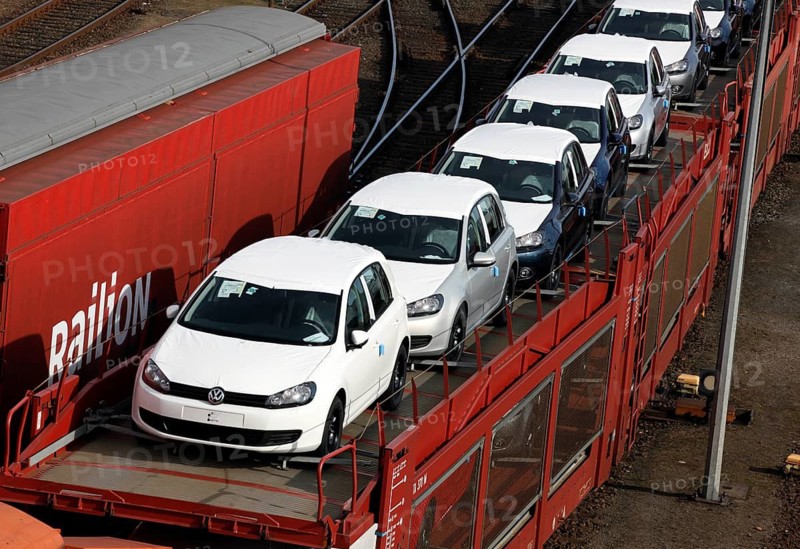 Wolfsburg, DEU, 250211 - Car transport wagons with new Volkswagen Golf and Tiguan vehicles on the Volkswagen factory premises, Wolfsburg, Germany