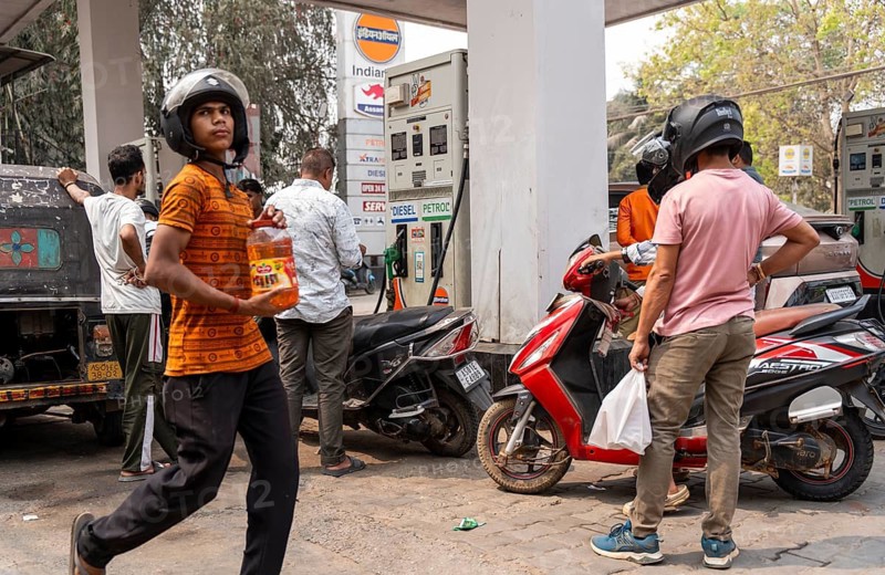 A fuel station attendant refuels vehicles at a petrol pump in Guwahati, India, on March 11, 2026. Oil prices reversed course from recent highs, slipping to around 90 USD a barrel after remarks by U.S. President Donald Trump on the Iran conflict. Markets remain unsettled as traders monitor the evolving geopolitical situation