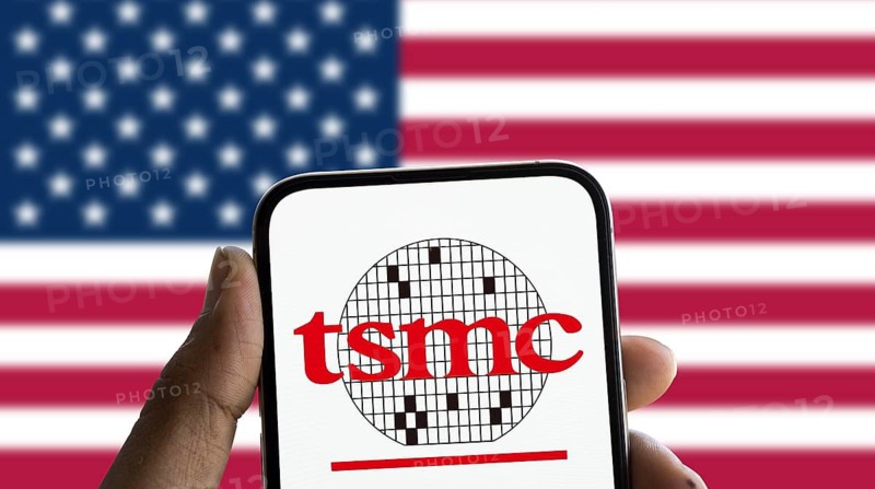 TSMC logo is displayed on smartphone and American flag on the background.