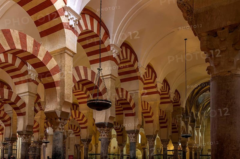 Cathedral Mosque of Cordoba (Mezquita-Catedral), Moorish architecture with red and white arches creating an Islamic mosque atmosphere, Cordoba, Andalusia, Spain