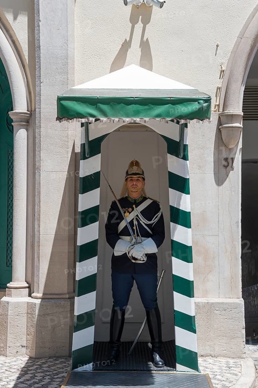 A guard in traditional uniform stands in a guardhouse, guard in the Barrio Alta and Chiado neighbourhood, Guarda Nacional Republicana, Lisbon, Lisboa, Portugal